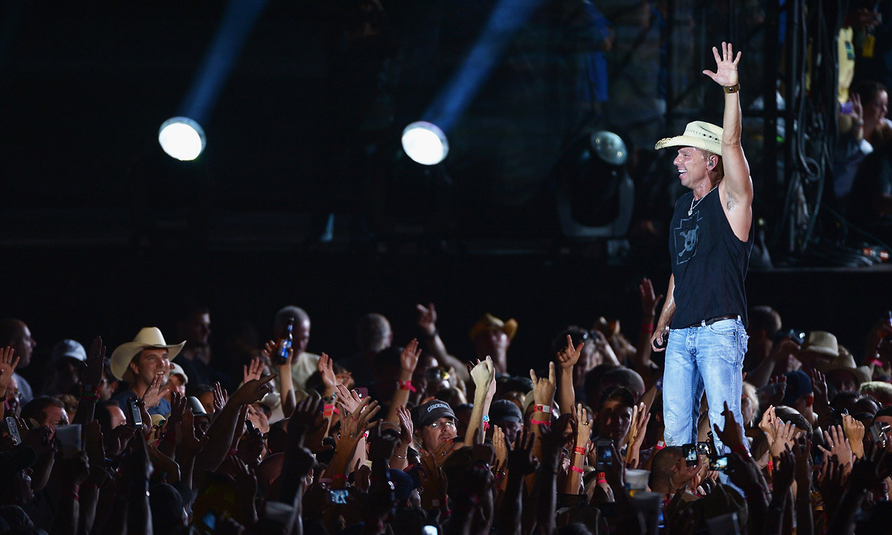 EAST RUTHERFORD, NJ - AUGUST 11: Musician Kenny Chesney performs during the Brothers of the Sun tour at MetLife Stadium on August 11, 2012 in East Rutherford, New Jersey. (Photo by Michael Loccisano/Getty Images)
